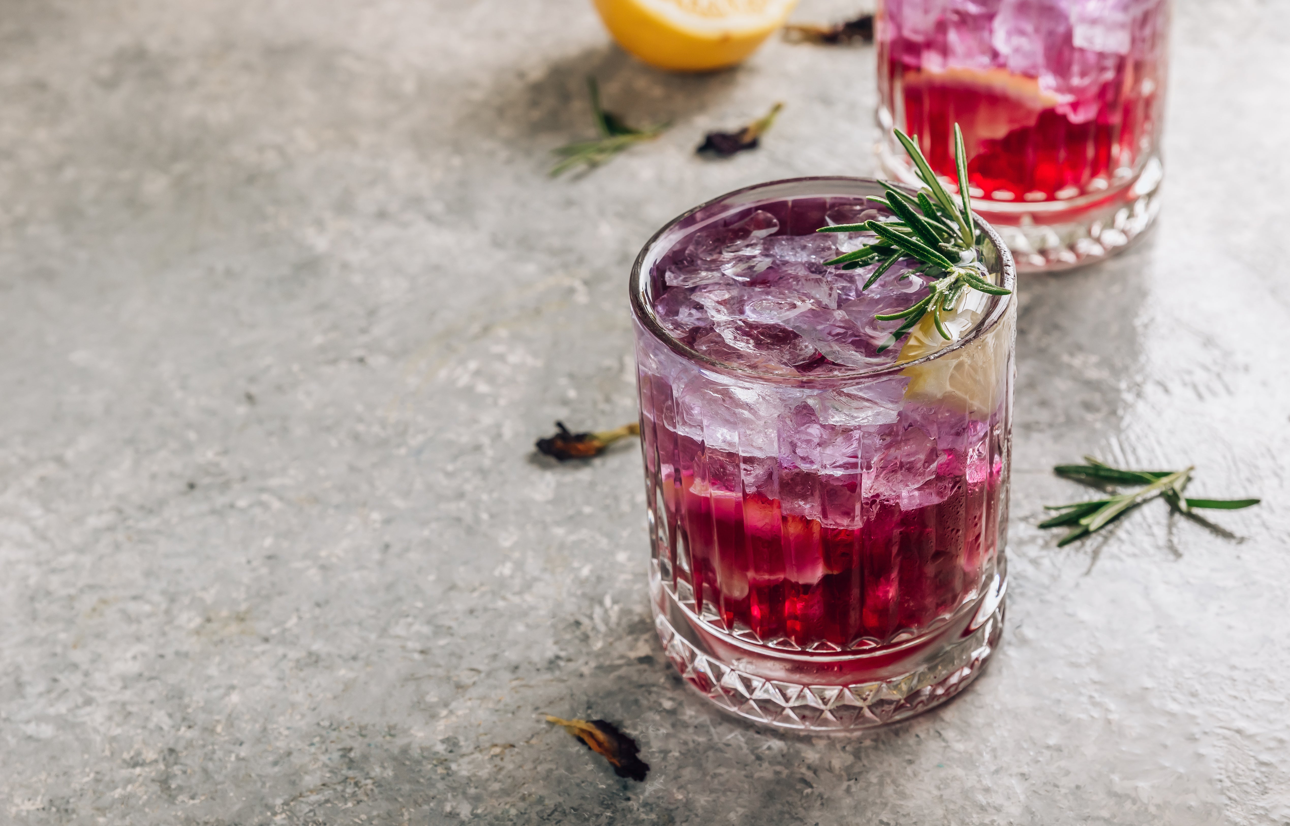 Butterfly pea flower tea with lemon slice, purple floral drink